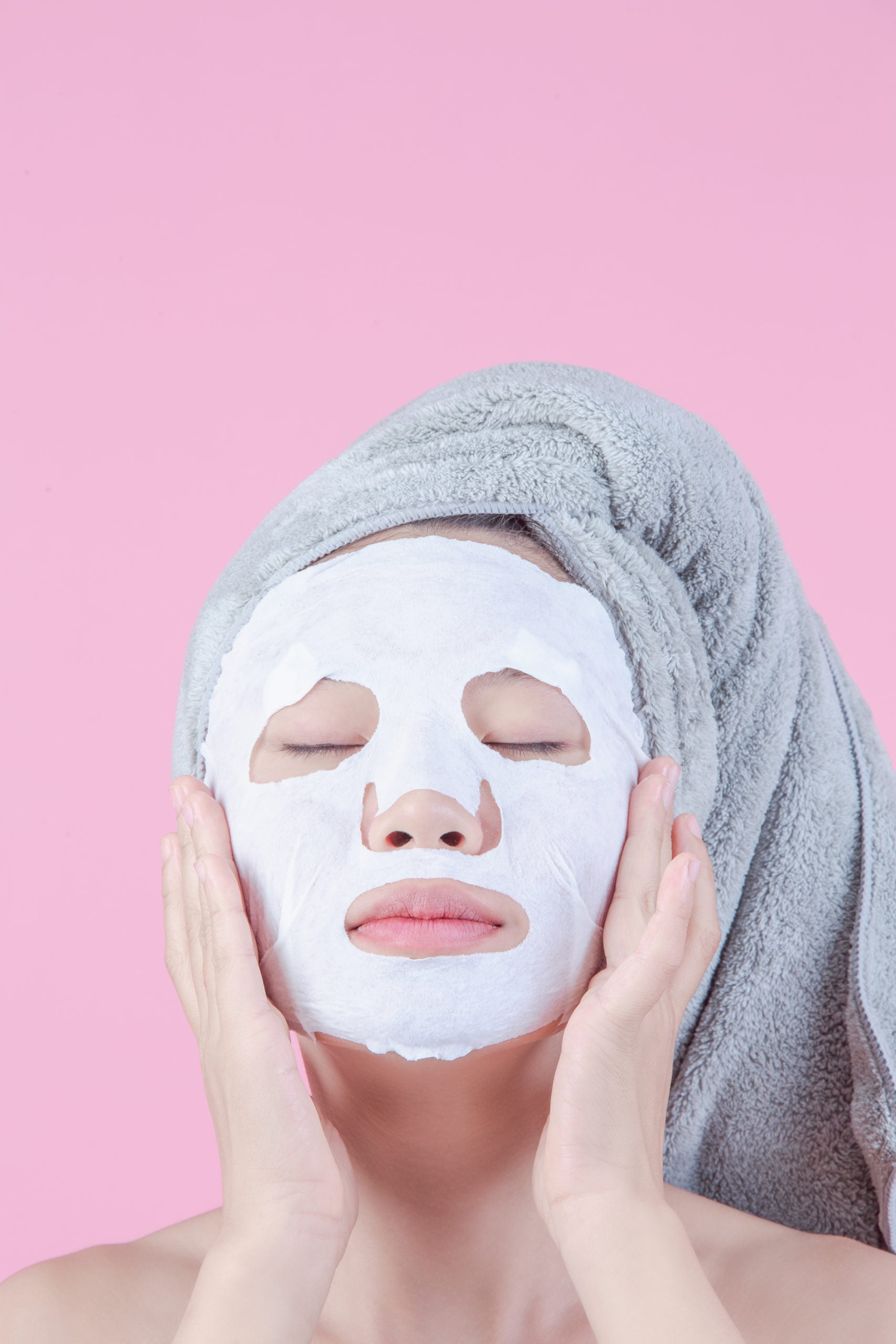 Woman wearing a sheet mask