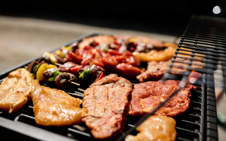 American BBQ brisket and ribs on a wooden board in a Seoul restaurant