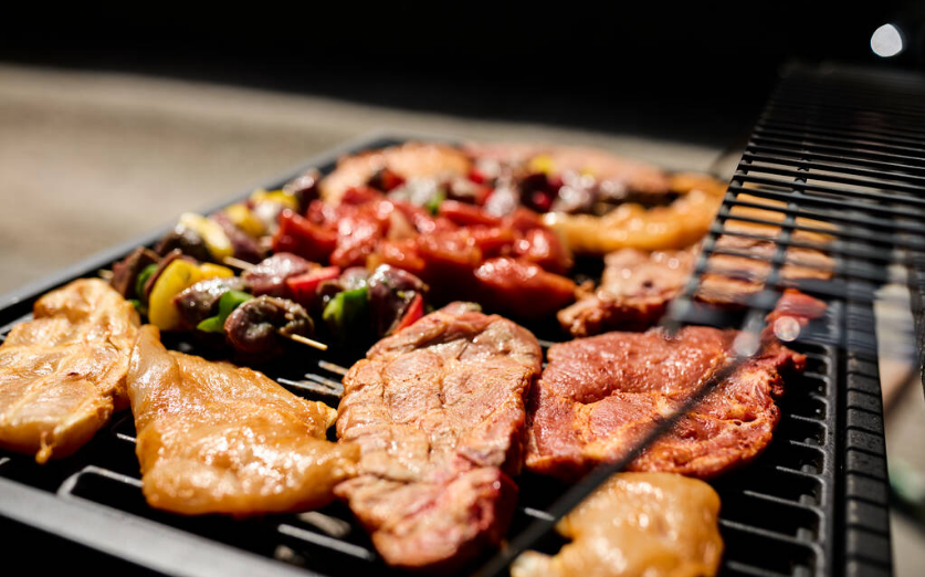 American BBQ brisket and ribs on a wooden board in a Seoul restaurant