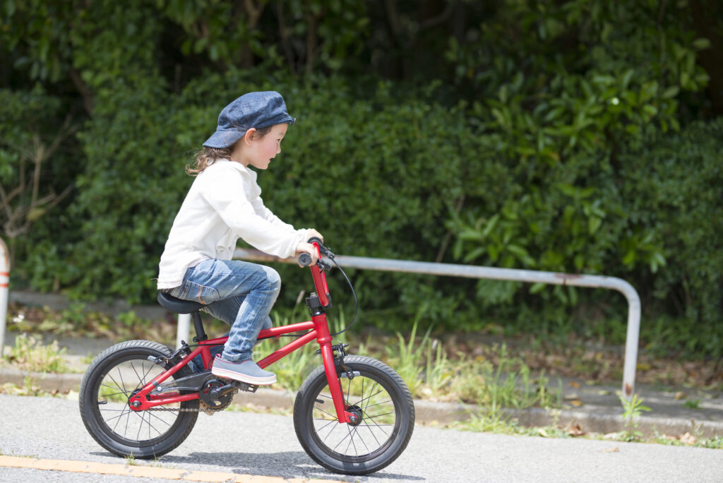 Korean kid on a bicycle