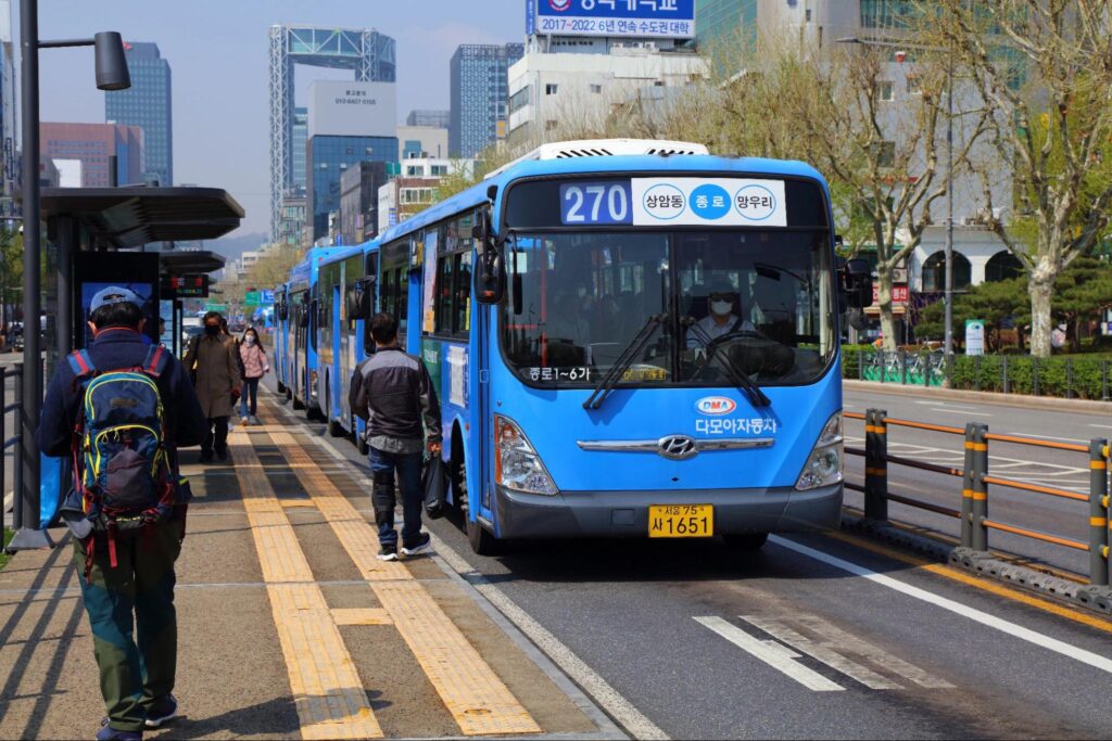 korean buses and bus stop blue